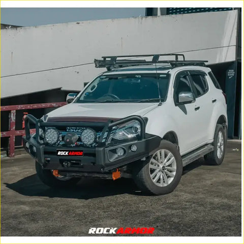 White isuzu d-max 4wd ute with black steel rockarmor elite hoop bullbar and roof rack for offroad use