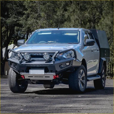 Silver isuzu d-max with black steel rockarmor gt hoop bullbar and rugged off-road tires front view