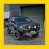 Black rockarmor gt hoop steel bullbar on lifted mitsubishi mv triton 2024 with off-road tires and heavy-duty front bumper