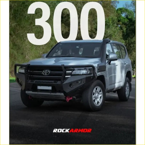 Silver toyota land cruiser 300 with black steel rockarmor gt hoop bullbar perfect for 4wd offroad ute adventures