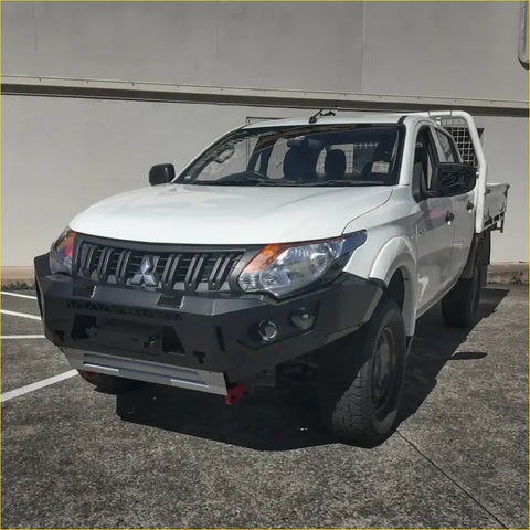 White mitsubishi triton ute with rockarmor gt hoopless steel bullbar featuring black bumper and chrome accents for offroad 4wd