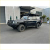 Black nissan patrol gu4 with rockarmor premium bullbar frontal combo and rugged offroad 4wd tires and roof rack