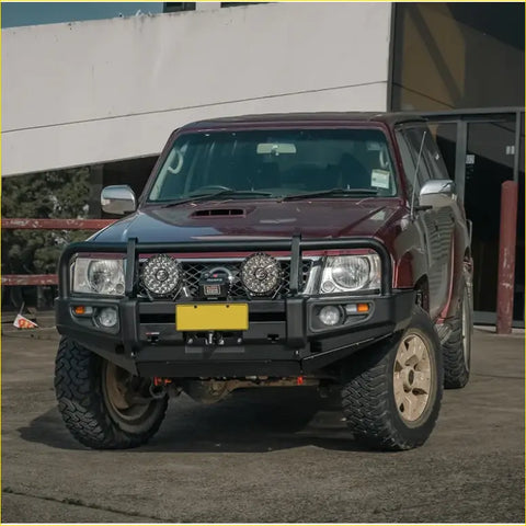 Maroon nissan patrol with rockarmor premium steel bullbar full bar replacement black bumper and offroad 4wd tires