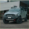 Silver ford ranger with black off-road tires and rugged front bumper featuring rockarmor gt hoopless bullbar and sliders