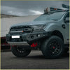 Gray ford ranger with rugged front bumper black off-road tires and roof rack featuring rockarmor rock pack gt hoopless bullbar and rock sliders