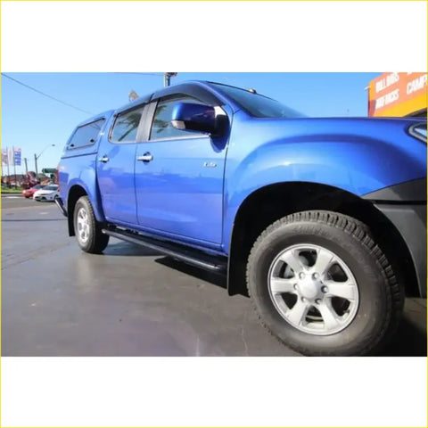 Vibrant blue metallic isuzu d-max ute with black rockarmor steel rockslider side steps perfect for offroad 4wd use