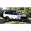 Silver nissan patrol y62 with black rockarmor steel rockslider side steps for offroad 4wd protection
