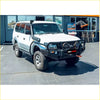White nissan patrol with black bumper and roof light showing rockarmor steel rockslider side steps for 4wd offroad use