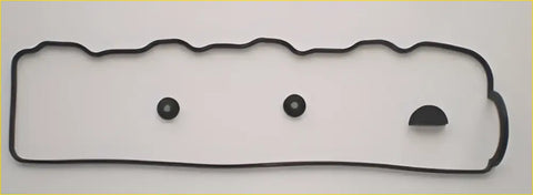 Black rubber rocker cover gasket with three circular mounting points and semi circular cutout for mitsubishi l200 shogun pajero