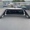 Back view of black metal truck bed rack with textured gray tonneau cover for isuzu d-max 2024+ roll bar sport bar t10
