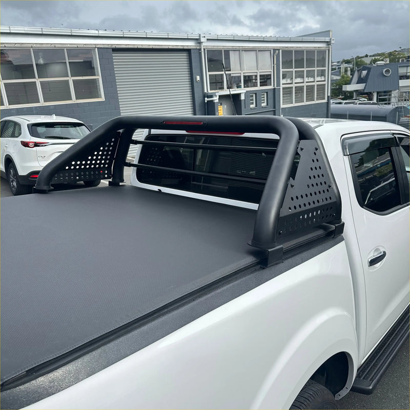 Black perforated steel roll bar sport bar with integrated side rails on white mazda bt-50 2006-2011 truck bed