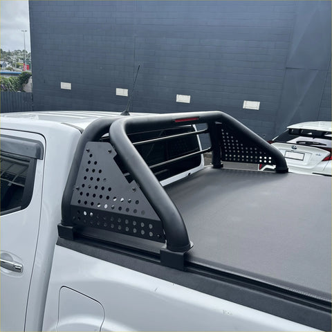 Black perforated metal roll bar with curved bars and integrated side panels for nissan navara np300 2015-2020