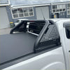 Black perforated metal roll bar with integrated side panels for nissan navara np300 2015-2020 truck bed rail back view