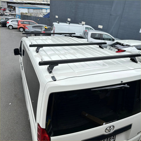 Black heavy duty roof rack 3 piece set mounted on the back of white 2019 toyota hiace zr zx van