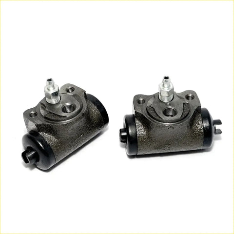 Pair of dark gray cast iron rr wheel brake cylinders with black rubber seals and silver fittings for mitsubishi galant