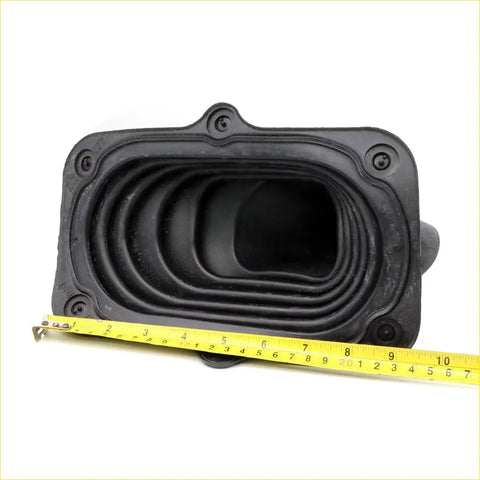 Black rubber shift boot cover gasket with concentric ridges and four holes for Toyota Hilux KUN15 2005-2015