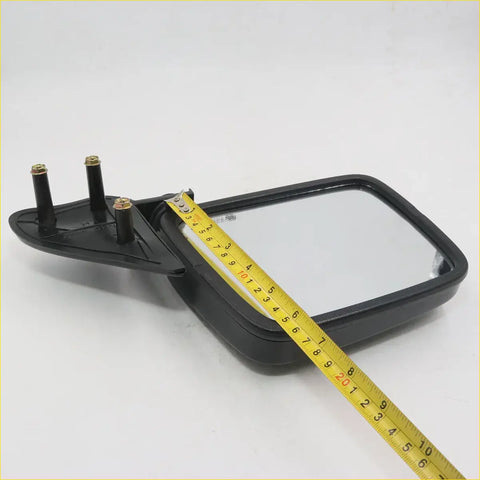 Black plastic side door mirror for nissan navara d21 ute 1986-1997 showing back with rectangular reflective surface and three mounts