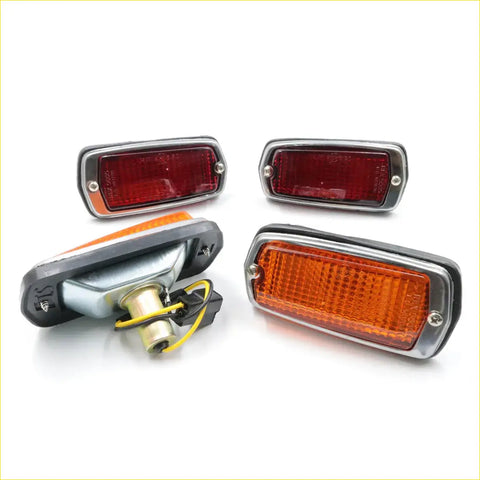 Set of four vintage-style rectangular side marker lights with chrome bezels and red and amber lenses for nissan datsun