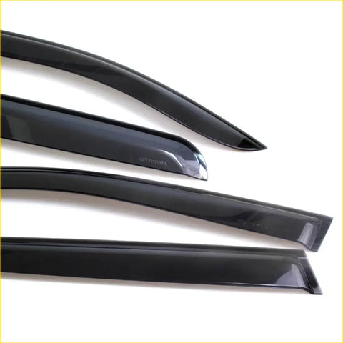 Black glossy finished side visor wind deflector with sleek curved design and subtle branding for toyota hilux kun26