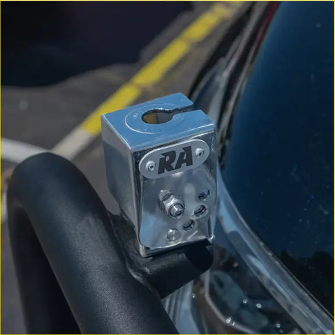 Chrome-plated metal hitch lock with ra branding and circular cutout for 4wd ute offroad slotted stainless steel folding antenna bracket