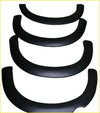 Black plastic smooth fender flares for Colorado 2017 to 2021 showing rear side of the product