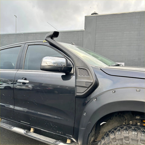 Black plastic snorkel mounted on the front of a dark gray ford ranger px2 px3 2016-2021 pickup truck