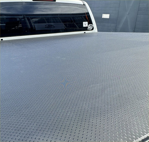 Gray textured diamond plate truck bed liner shown on the back side for ford ranger px1 px2 px3 double cab 2012-2021