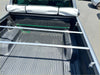 Silver metal bed rack with two bars installed in back of truck bed for soft tonneau cover isuzu d-max double cab
