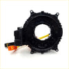 Black plastic airbag tensioner assembly with orange and yellow connectors for spiral cable clock spring Mitsubishi Galant Endeavor
