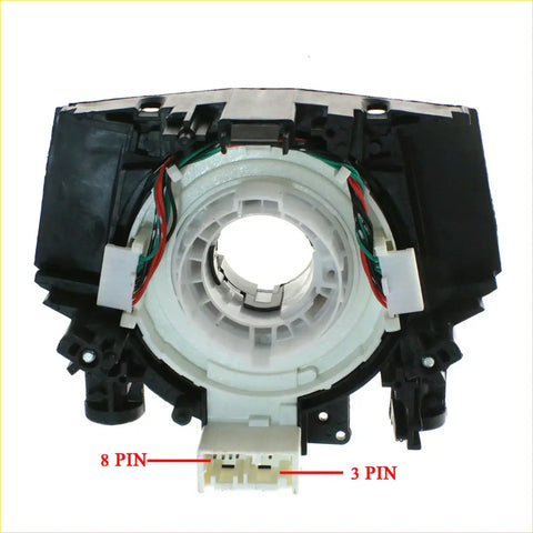 Black and white plastic steering wheel airbag sensor assembly with red green and black wiring for nissan navara d40