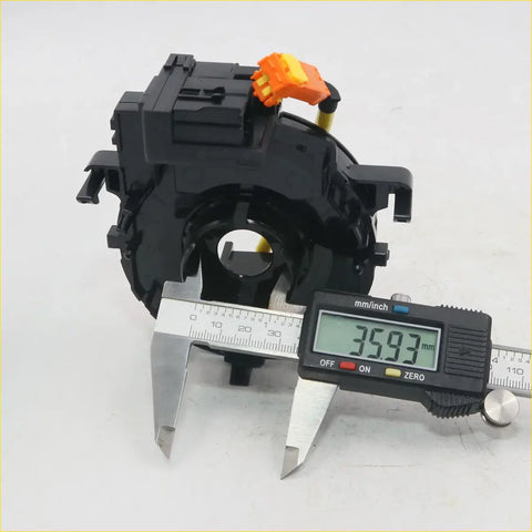 Black plastic steering wheel airbag sensor with orange connector for spiral cable clock spring toyota hilux 2004-2015 back side