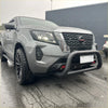 Silver nissan navara pickup with stainless steel medium size nudge bar 2021 plus and black off-road bumper