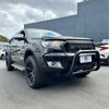 Black ford ranger with stainless steel nudge bar, rugged front bumper guard, and matte black alloy wheels for px1/2/3 2012-2021
