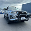 Silver toyota hilux with matte black stainless steel nudge bar front bumper guard and roof rack 2015-2020 model