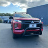 Red mitsubishi triton with a black stainless steel nudge bar and roof rack compatible with 2019 to 2023 models