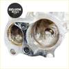Silver metallic engine cylinder head showing combustion chambers and bolts for stainless steel turbo elbow downpipe