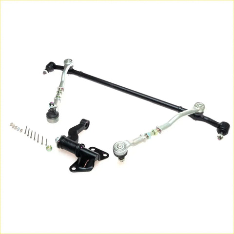 Black and silver metal steering drag link kit for Nissan NP300 Navara 1997-2023 shown from the back side