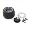 Black rubber steering hub adapter with blue wire and metal parts for Daihatsu Mira Domino 1980-1994 back side view