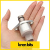 Silver metallic suction control valve with flanged base and threaded ports held in hand for nissan navara d40 isuzu use