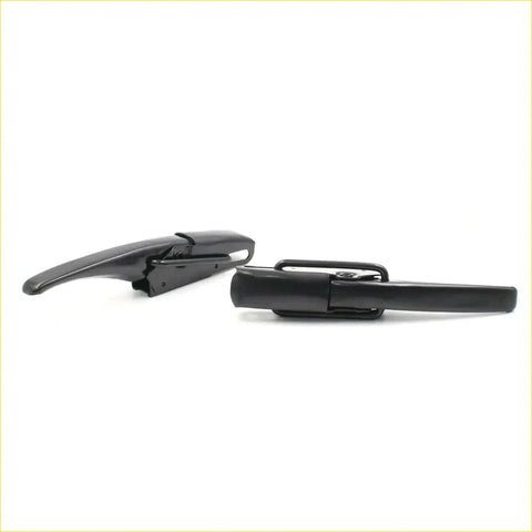 Black plastic tail gate lock handle end caps with integrated clips for toyota hilux 1979-1983 shown from back