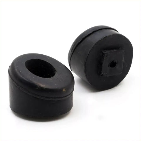 Black rubber tail gate bumpers with circular shape and central hole one with square indentation for Nissan Datsun 520 620 720
