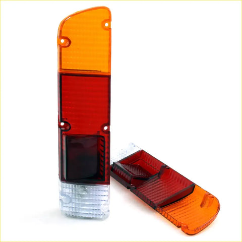 Tail light lens assembly for nissan datsun 620 ute j15 1500 72-79 in orange red plastic with clear lower section
