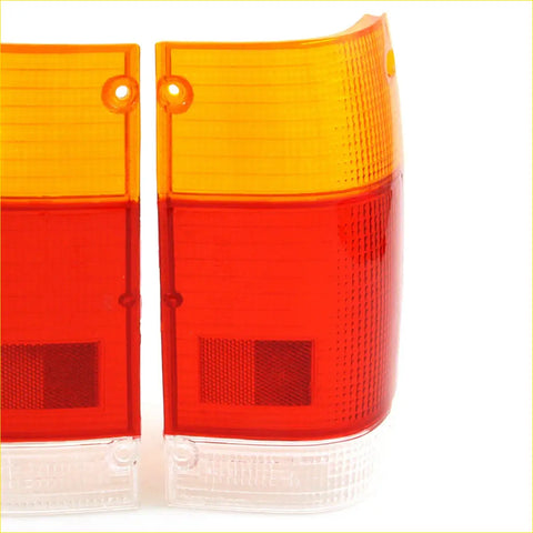 Orange and red plastic tail light lens set with textured surfaces for mazda b2500 b2200 b2600 fighter 1985-1998