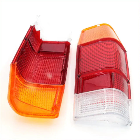 Tail light lens lh for mazda b1600 b1800 1971-1978 red and orange plastic with textured grid pattern visible from back side