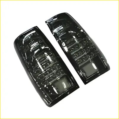 Black smoked led tail lights with clear lens and sleek design for toyota landcruiser 80 series rear lamp pair lh and rh back view