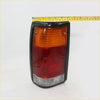Black plastic tail light assembly with amber and red lenses for mazda b2000 b2200 b2600 1985-1998