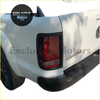 Silver metallic vw amarok pickup truck back side with black tail lights covers surrounds trim from 2009 to 2019