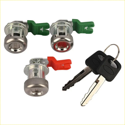 Silver tailgate and ignition door lock cylinders with green and red retainers and black key fobs for ford f-250 f-350