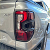 Back side of ford ranger 2022+ taillight covers with matte black trim and modern red and clear lens design