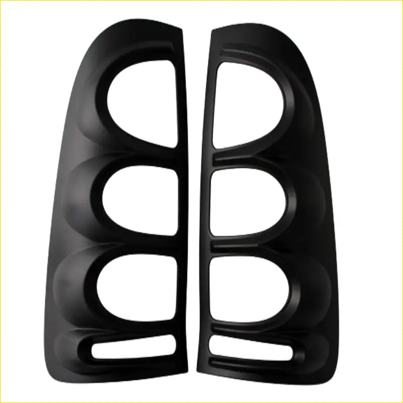 Black plastic side mirror covers for toyota hilux vigo 2005-2012 with glossy finish and three oval cutouts each
